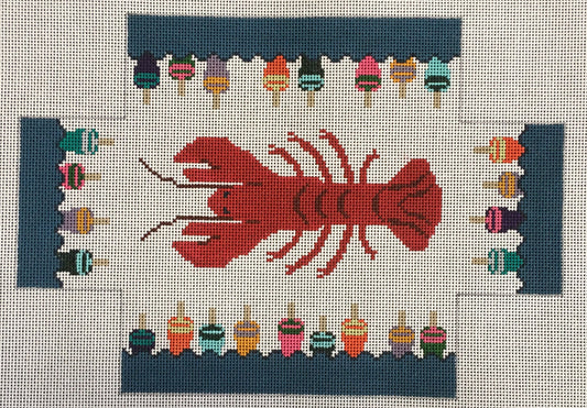 J Child needlepoint canvas for a brick cover with a lobster on the top and buoys in the water around the edges