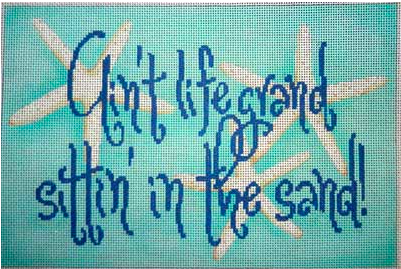 Associated Talents needlepoint canvas of the saying "ain't life grand sittin' in the sand!" in blue on an aqua background with starfish