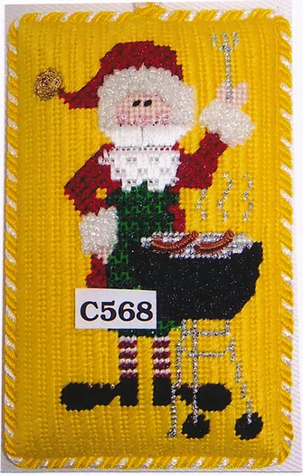 Princess and Me Christmas needlepoint canvas with stitch guide of a Santa grilling hot dogs wearing an apron