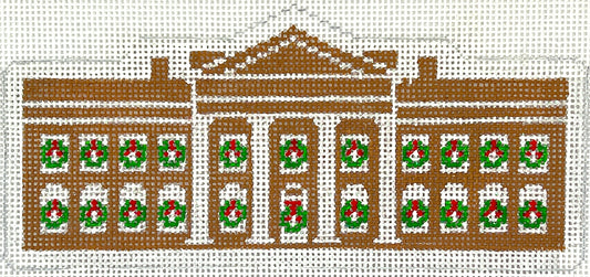 Kate Dickerson Christmas needlepoint canvas of the White House in Washington D.C. made of gingerbread with wreaths decorating the windows
