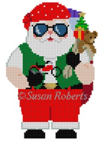 Susan Roberts Christmas needlepoint canvas of Santa holding his toy bag with a teddy bear and a model motorcycle wearing a bandana and goggles