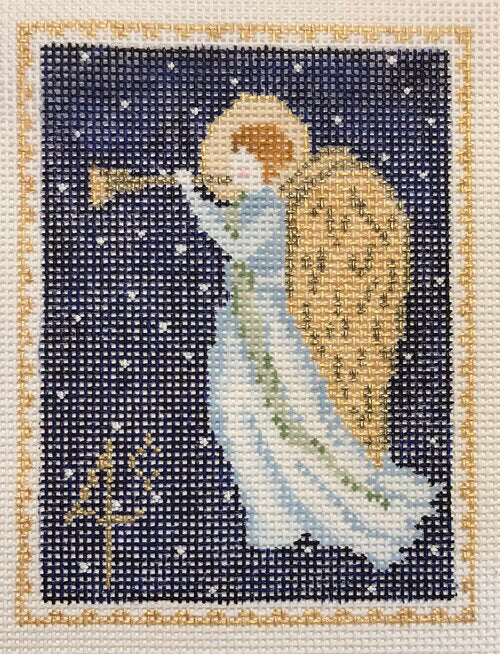 Plum Stitchery needlepoint canvas of a vintage-style postage stamp of an angel with gold wings and halo playing a trumpet