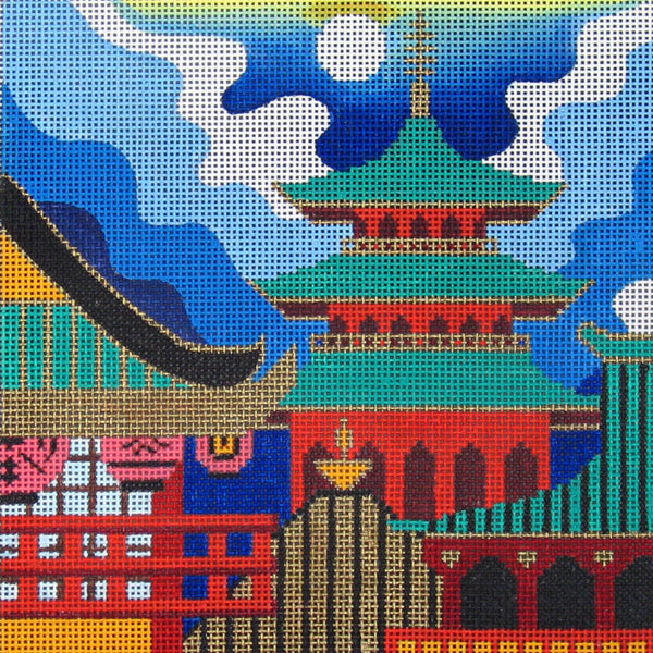 Amanda Lawford needlepoint canvas of a skyline in Japan