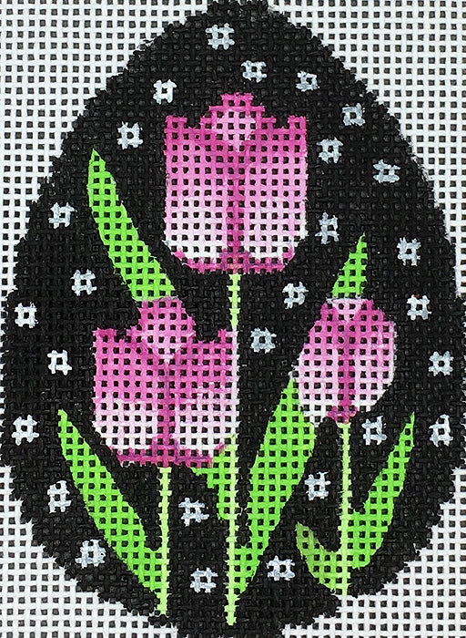 Amanda Lawford Easter egg shaped needlepoint canvas with tulips and mod black and white background