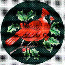 Amanda Lawford round needlepoint canvas of a cardinal on a holly tree branch with leaves and berries on a black background