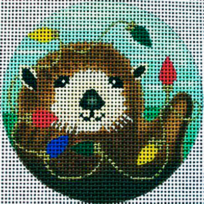 Amanda Lawford whimsical and fun round needlepoint canvas of sea otter holding multicolored Christmas lights