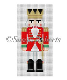 Susan Roberts needlepoint canvas of a traditional style royal nutcracker king wearing a red jacket and a gold crown with a sword at his belt
