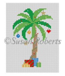 Susan Roberts Christmas needlepoint canvas of a palm tree decorated with ornaments with presents under it - perfect for a tropical Christmas!