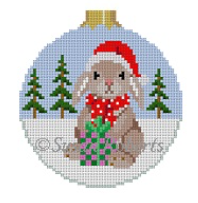 Susan Roberts needlepoint canvas Christmas ornament (round with ball top) of a bunny rabbit holding a present wearing a Santa hat with snow and pine trees