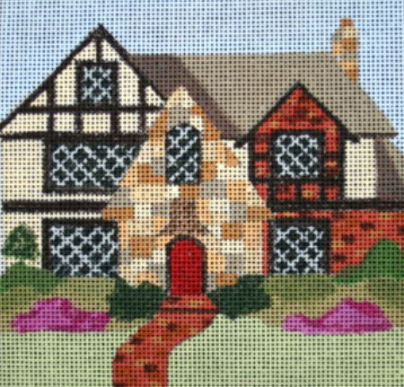 Melissa Prince needlepoint canvas of a Tudor house with a green lawn and a brick walkway to the front door