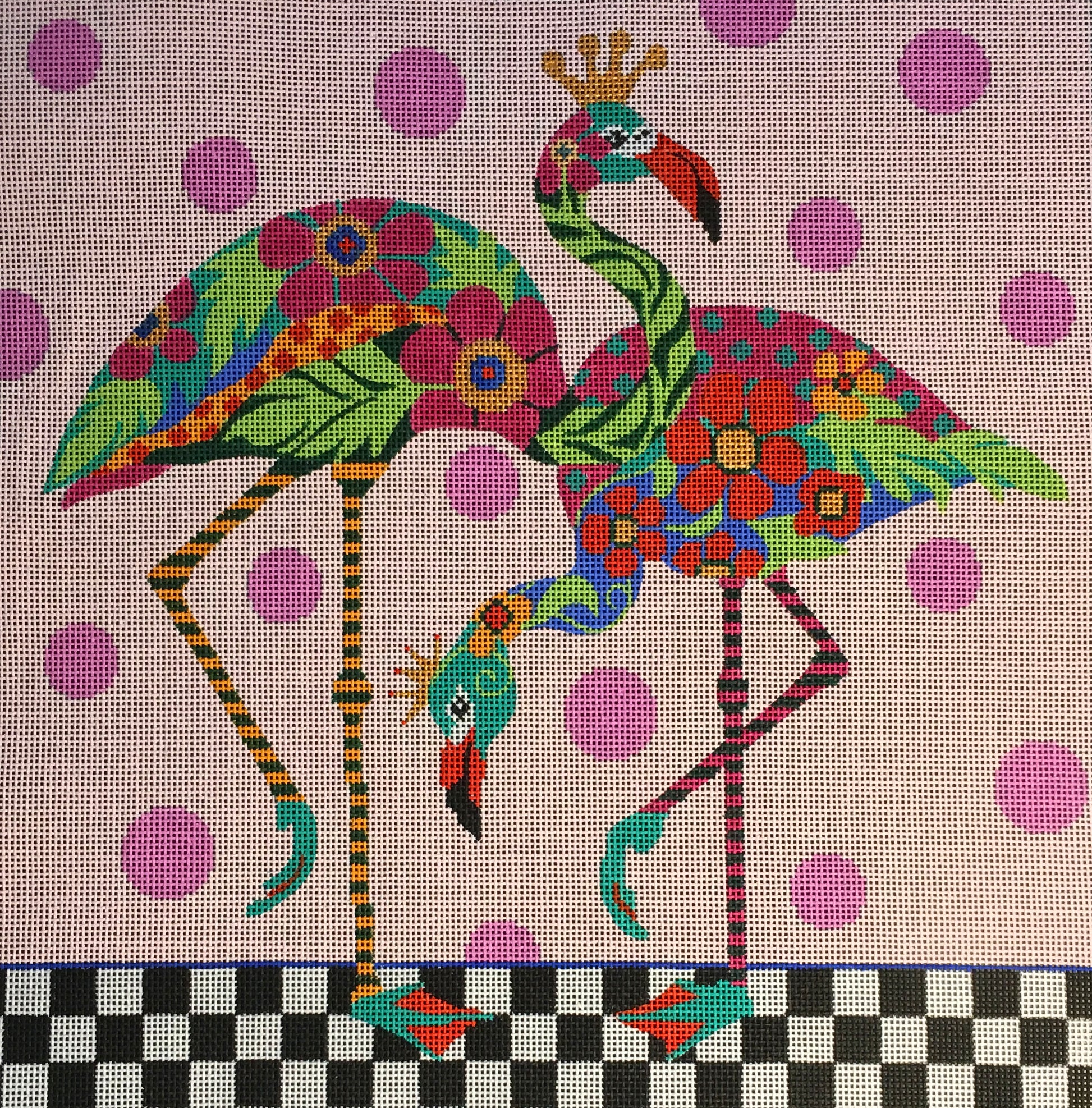 Amanda Lawford bright needlepoint canvas of two vibrantly patterned flamingos wearing crowns on polka dot background