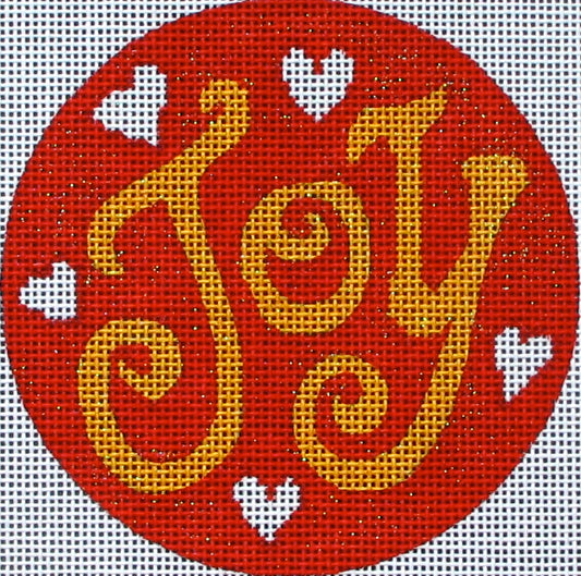 DC designs round needlepoint canvas of the word joy in gold on a red background with white hearts