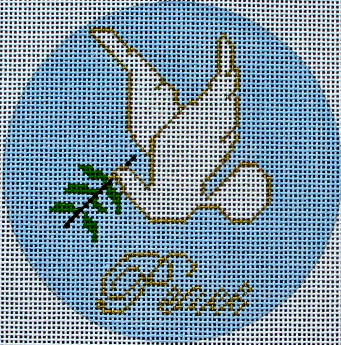 DC designs round needlepoint canvas of a dove holding an olive branch with the word "peace" in gold
