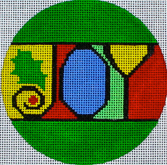DC designs round Christmas ornament needlepoint canvas of the word "joy" in bright and vibrant colors with a holly leaf
