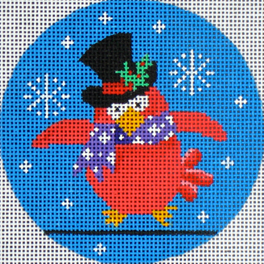 DC designs whimsical Christmas ornament needlepoint canvas of a bird wearing a top hat with holly leaves and a snowy background