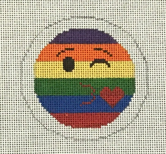 Sew Much Fun needlepoint canvas of the kissy face emoji but with LGBTQIA+ rainbow pride stripes