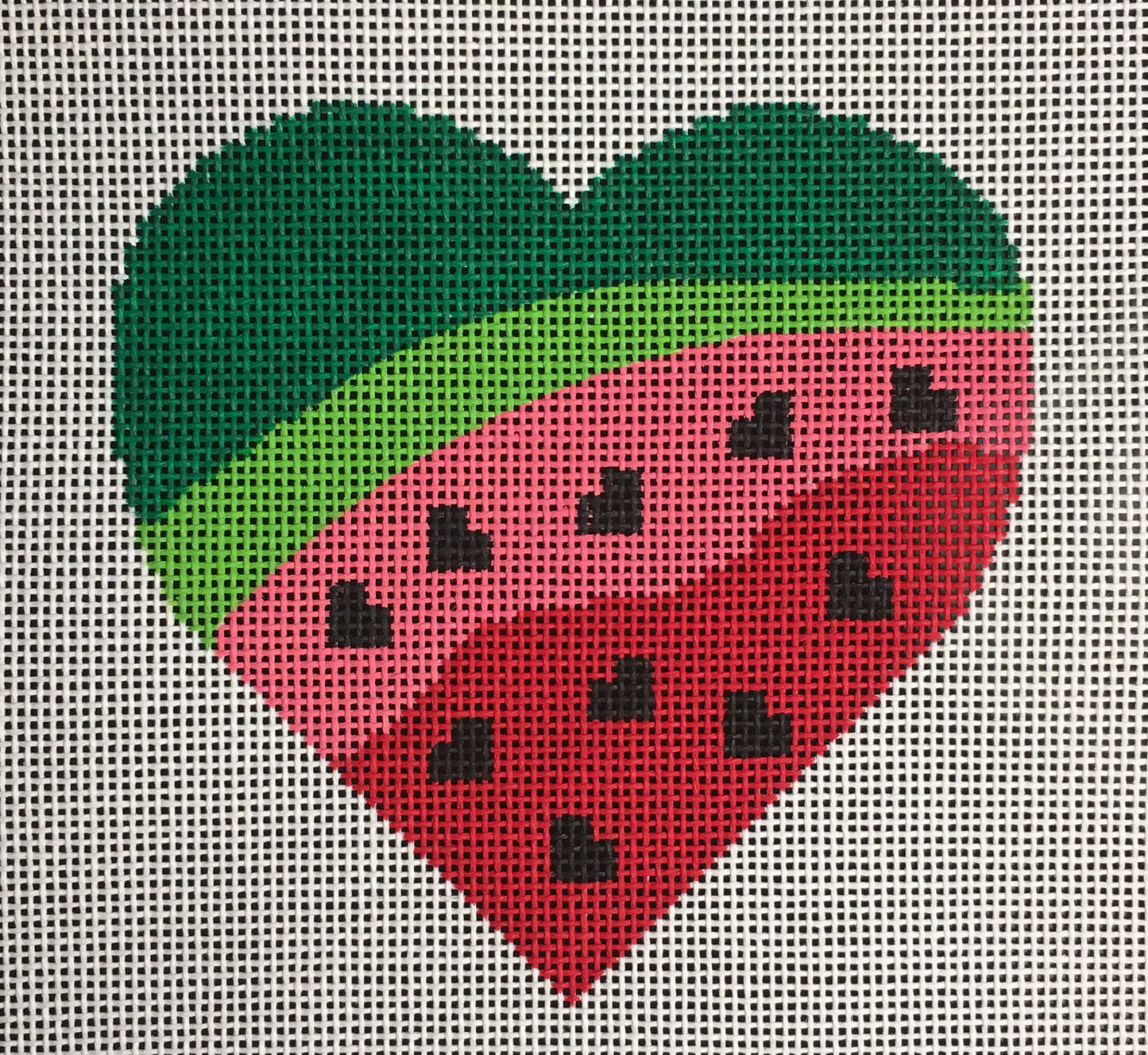 Vallerie Needlepoint Gallery heart shaped needlepoint canvas of a watermelon with heart-shaped seeds in fun whimsical and bright colors