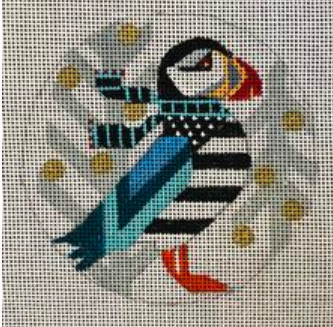 Melissa Prince geometric colorful round needlepoint canvas of puffin wearing a scarf with winter trees