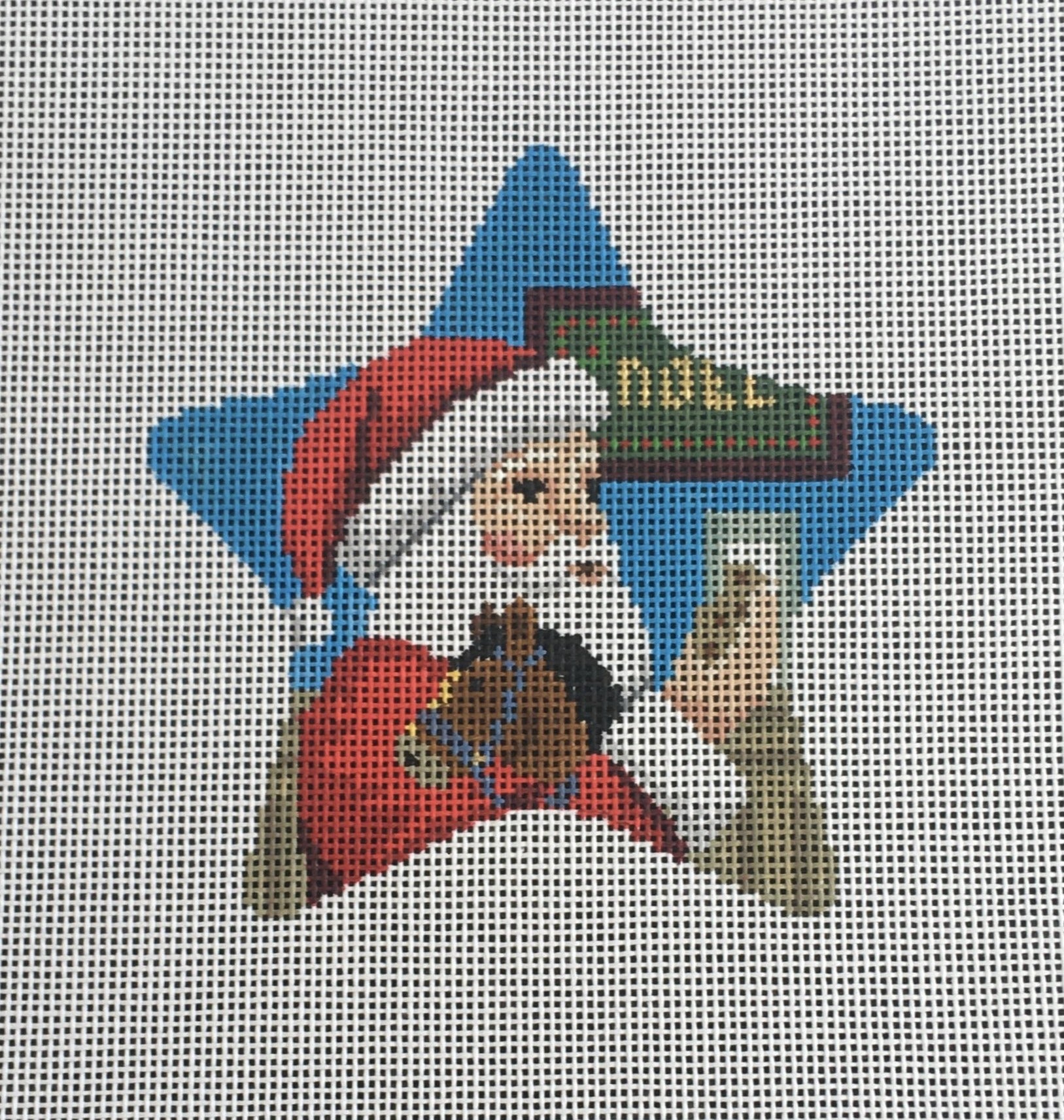 Susan Roberts star needlepoint canvas of Santa with milk and cookies