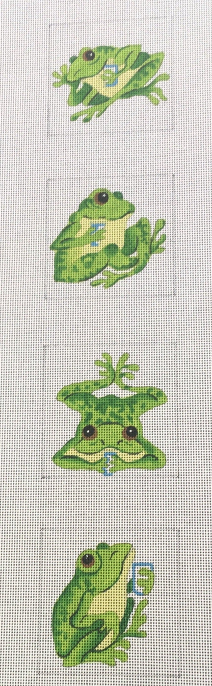 Susan Roberts needlepoint canvas of a set of four coasters of whimsical frogs drinking