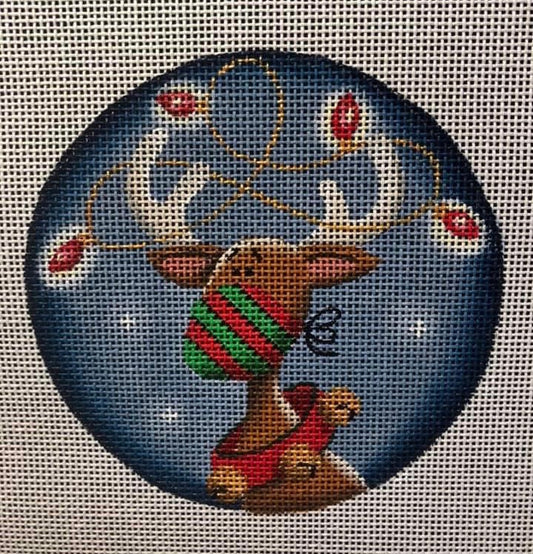 Round Christmas ornament reindeer wearing a face mask with lights in the antlers and a jingle bell collar Rebecca Wood needlepoint canvas