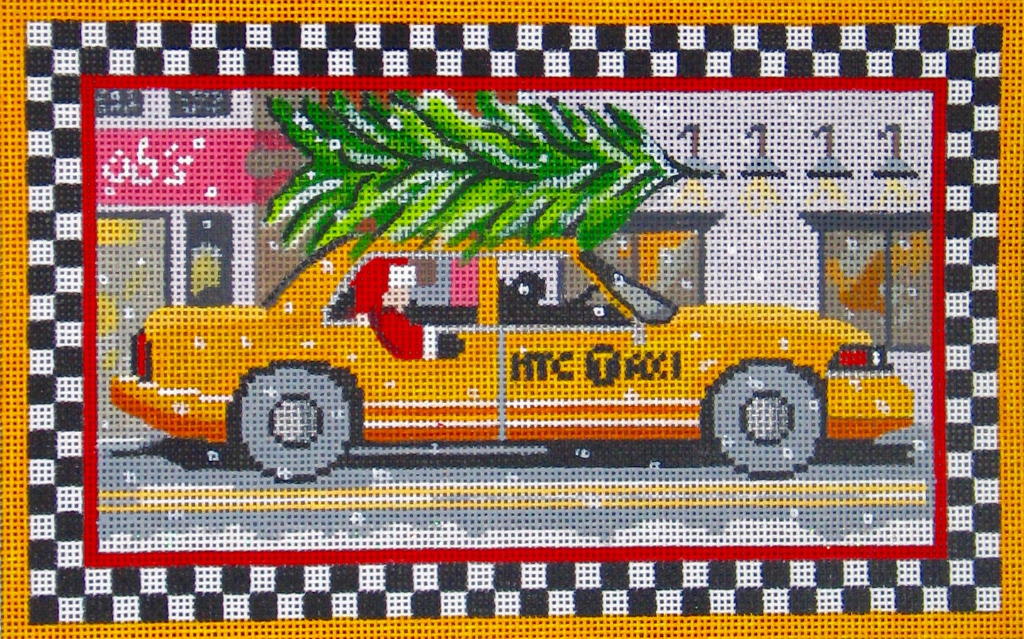 Amanda Lawford Christmas needlepoint canvas of Santa Claus riding in a New York City taxi cab with a Christmas tree on top