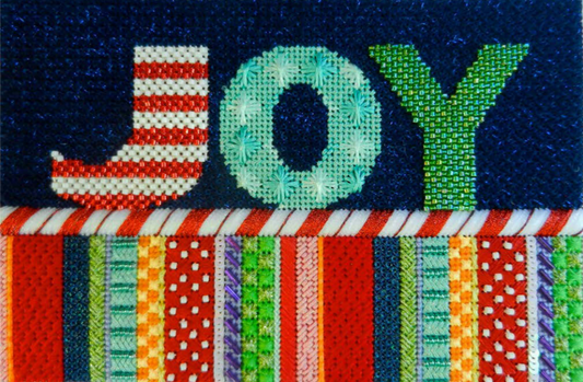 Associated Talents needlepoint canvas of the word Joy with candy cane border and stripes