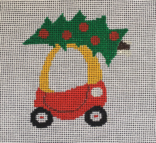 Vallerie Needlepoint Gallery round whimsical needlepoint canvas of a child's Little Tykes toy car with a Christmas tree on top