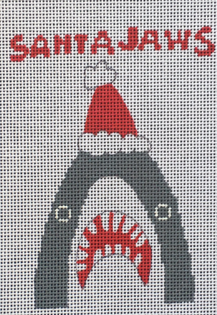 Vallerie Needlepoint Gallery canvas of a shark wearing a Santa hat with the pun phrase "Santa Jaws" inspired by the movie