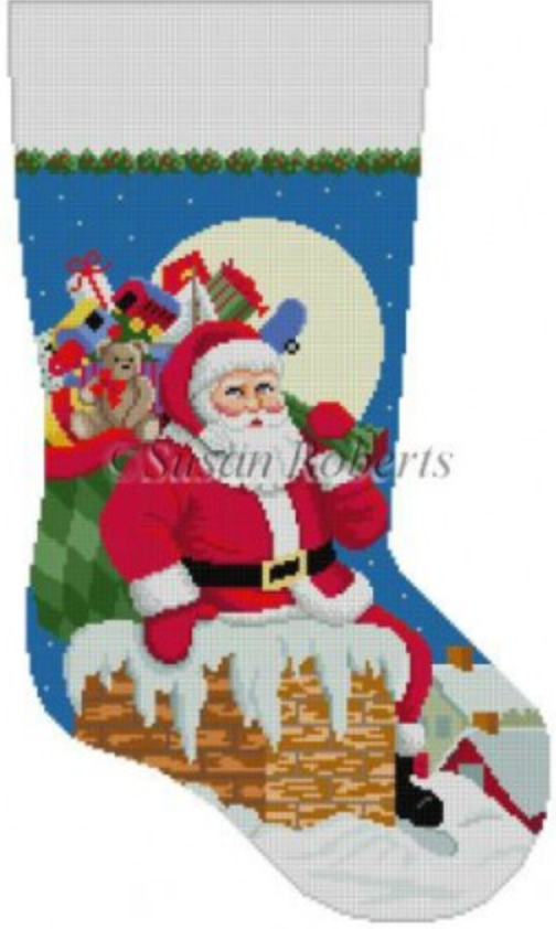 Susan Roberts needlepoint canvas for a Christmas stocking with Santa carrying a bag of toys and climbing down a chimney