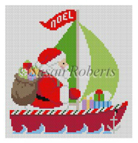 Susan Roberts needlepoint canvas of a Santa in traditional red with a bag of toys over his shoulder sailing a red boat with green sails and a pennant that says "Noel"