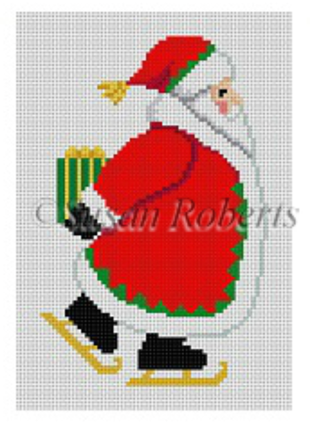 Susan Roberts needlepoint canvas of a Santa wearing red with white and green trim ice skating and hiding a present behind his back