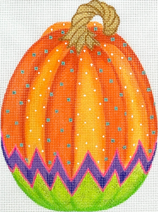 Kate Dickerson needlepoint canvas of a shaped standup pumpkin (part of her funky pumpkins series) with a lime green bottom and an orange top with tiny white and silver polka dots and a purple and hot pink zig zag separating the two sections