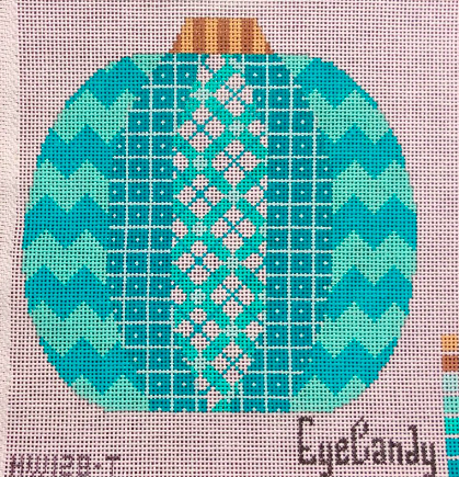 Eye Candy pumpkin needlepoint canvas in aqua and turquoise with zig zags and plaid