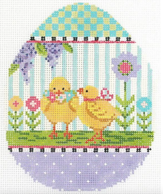 Kelly Clark Easter egg needlepoint canvas of two chicks in a garden with flowers and lilacs on a striped background