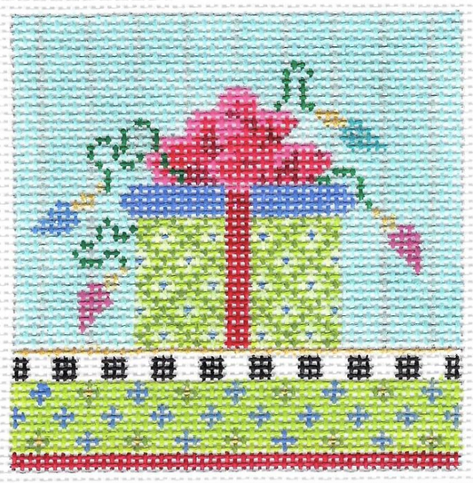 Kelly Clark needlepoint canvas of a wrapped gift package in lime green with a hot pink bow and decorative lights sized for a self-finishing box (insert)