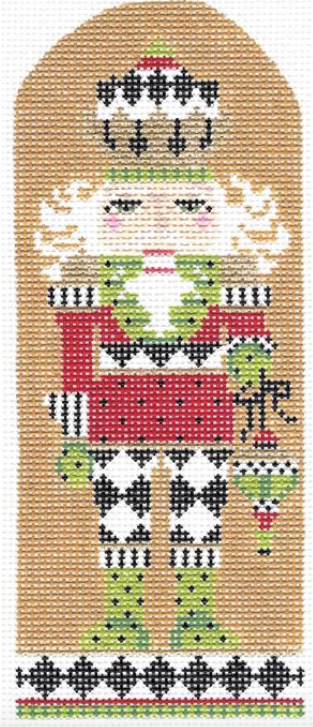 Kelly Clark Christmas needlepoint canvas of a nutcracker with black and white harlequin diamonds