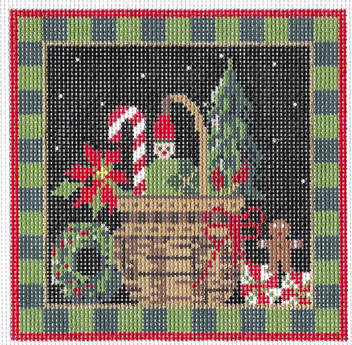 Kelly Clark needlepoint canvas of a Christmas basket with gingerbread and poinsettia and a checkered border