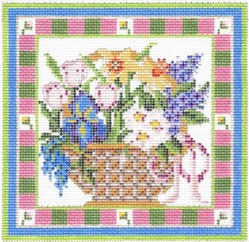 Kelly Clark needlepoint canvas of a springtime flower basket with irises and daffodils