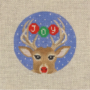 Amanda Lawford round Christmas ornament needlepoint canvas of Rudolph the reindeer with ornaments between the antlers that spell joy in green and red with a snowy background