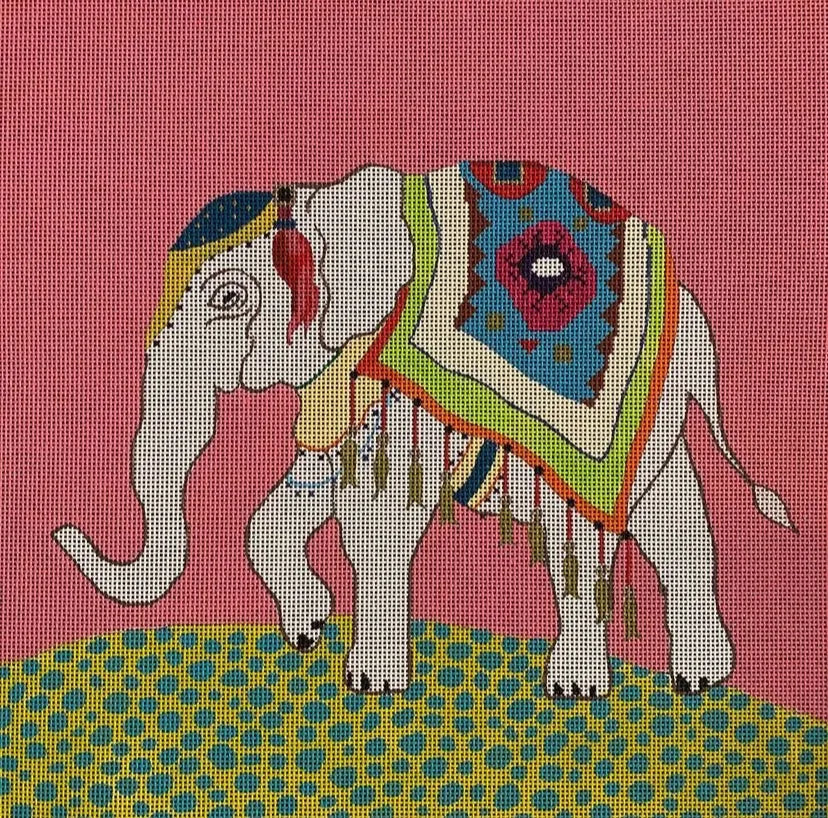 Colors of Praise needlepoint canvas of an elephant wearing a tasseled blanket on a green and turquoise ground with a pink background