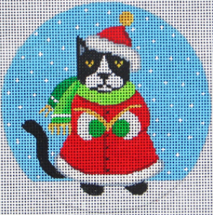 DC Designs whimsical round Christmas ornament needlepoint canvas of a cat wearing a Santa hat and a scarf holding a book with snow in the background