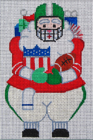 DC Designs Christmas needlepoint canvas of Santa ready to play football wearing a helmet and holding a football and a shield of the National Football League (NFL)