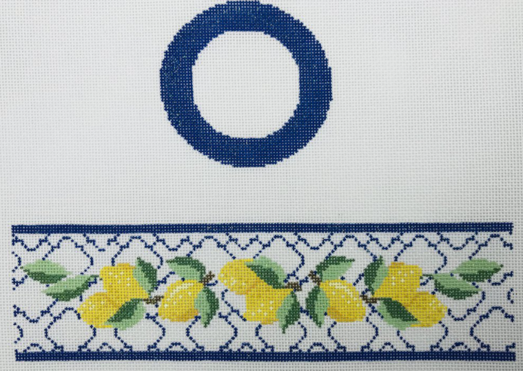 Funda Scully needlepoint canvas for a round hinged box patterned with French country tile and lemons in a Provencal farmhouse style
