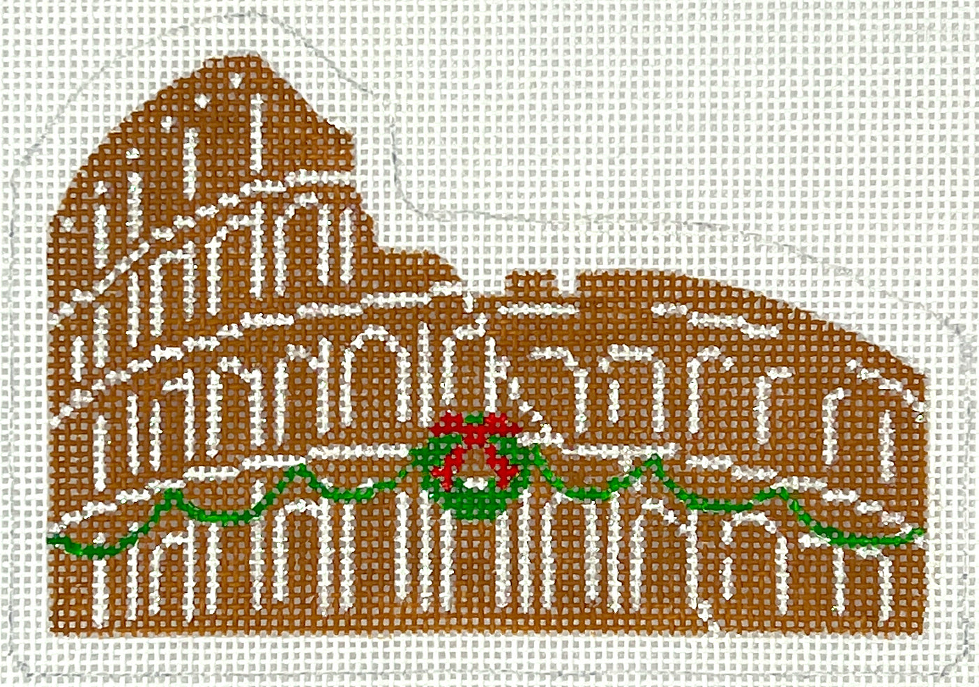 kate dickerson needlepoint canvas of the Colosseum in Rome, Italy made of gingerbread with Christmas garland and a wreath decorating it