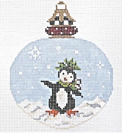 Kelly Clark needlepoint canvas of a Christmas ornament of a penguin dancing in the snow with a decorative ball top