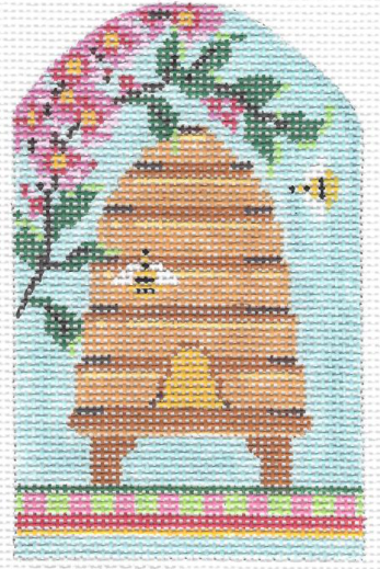 Kelly Clark spring needlepoint canvas of a bee skep with bees and pink cherry blossom flowers