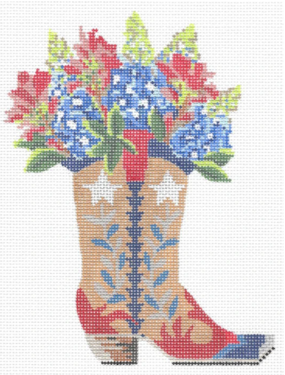 Kelly Clark needlepoint canvas of a red white and blue Texan cowboy boot filled with flowers (bluebonnets and indian paintbrush)