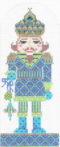 Kelly Clark Christmas needlepoint canvas of a blue and green nutcracker holding ornaments