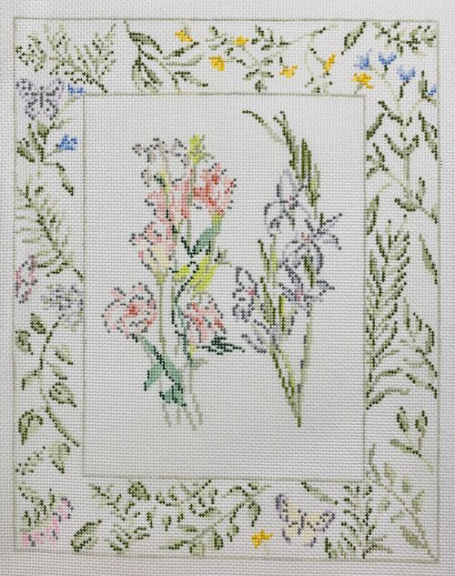 Riley Sheehey for Plum Stitchery spring needlepoint canvas of texas bluebells and gladiolus flowers with floral border